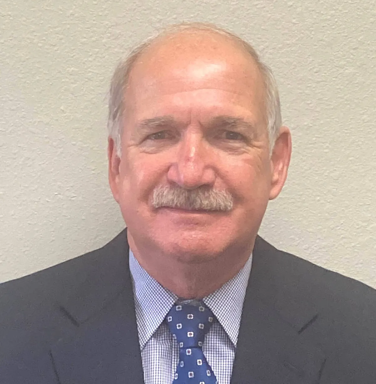 Howard C. Bluhm, Founder and Senior Partner
